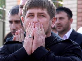 Chechen leader Ramzan Kadyrov prays as h