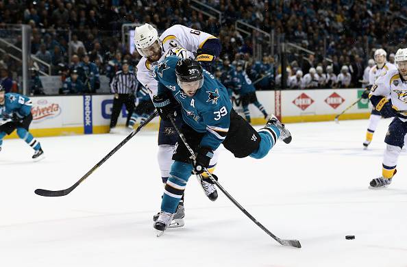 SAN JOSE, CA - MAY 07: Logan Couture #39 of the San Jose Sharks is hit by Shea Weber #6 of the Nashville Predators in Game Five of the Western Conference Second Round during the 2016 NHL Stanley Cup Playoffs at SAP Center on May 07, 2016 in San Jose, California. (Photo by Ezra Shaw/Getty Images)