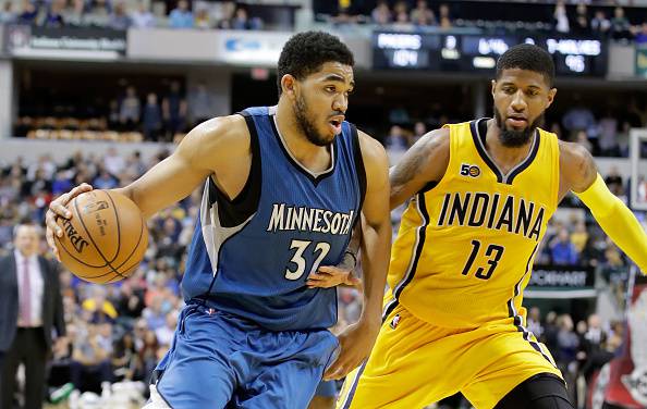 Karl-Anthony Towns e Paul George 