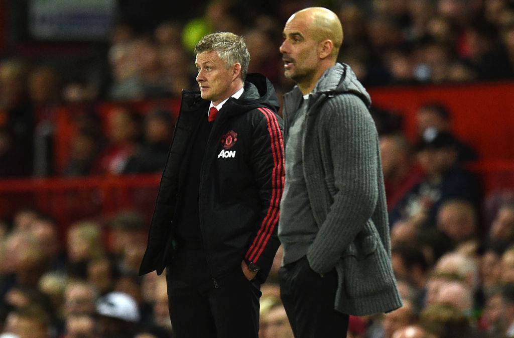 Solskjaer e Guardiola durante il derby